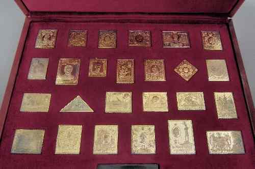 Appraisal: An Elizabeth II collection of twenty-five silver gilt stamps -