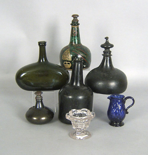 Appraisal: Five green glass bottles together with a cobalt creamer and