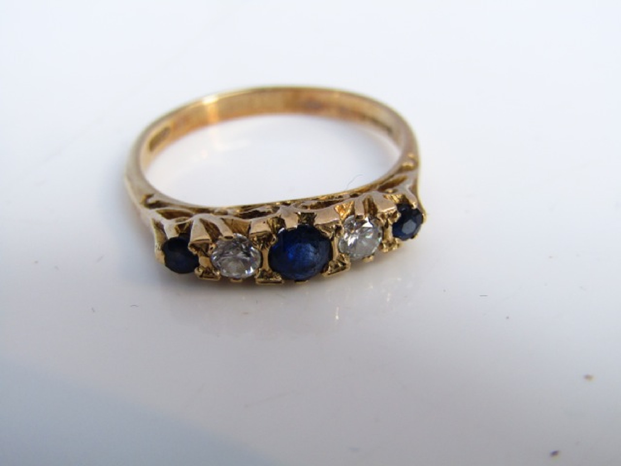 Appraisal: An Edwardian style sapphire and diamond ring set with three