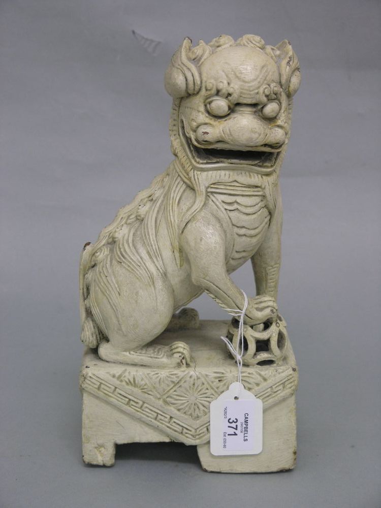 Appraisal: A th century Chinese carved wood model of a kylin