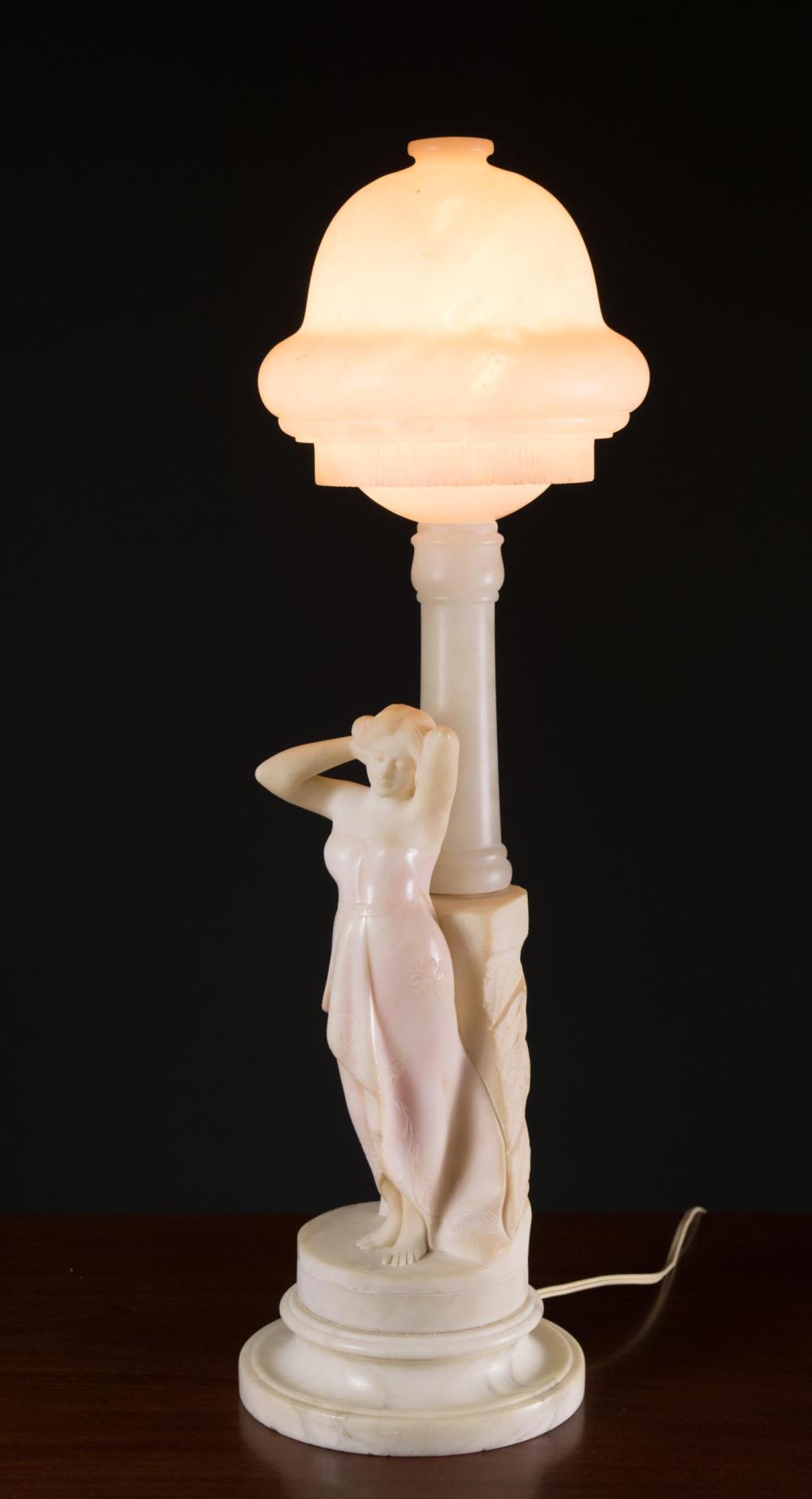 Appraisal: ALABASTER CARVED FIGURAL TABLE LAMP standing woman beneath a domed