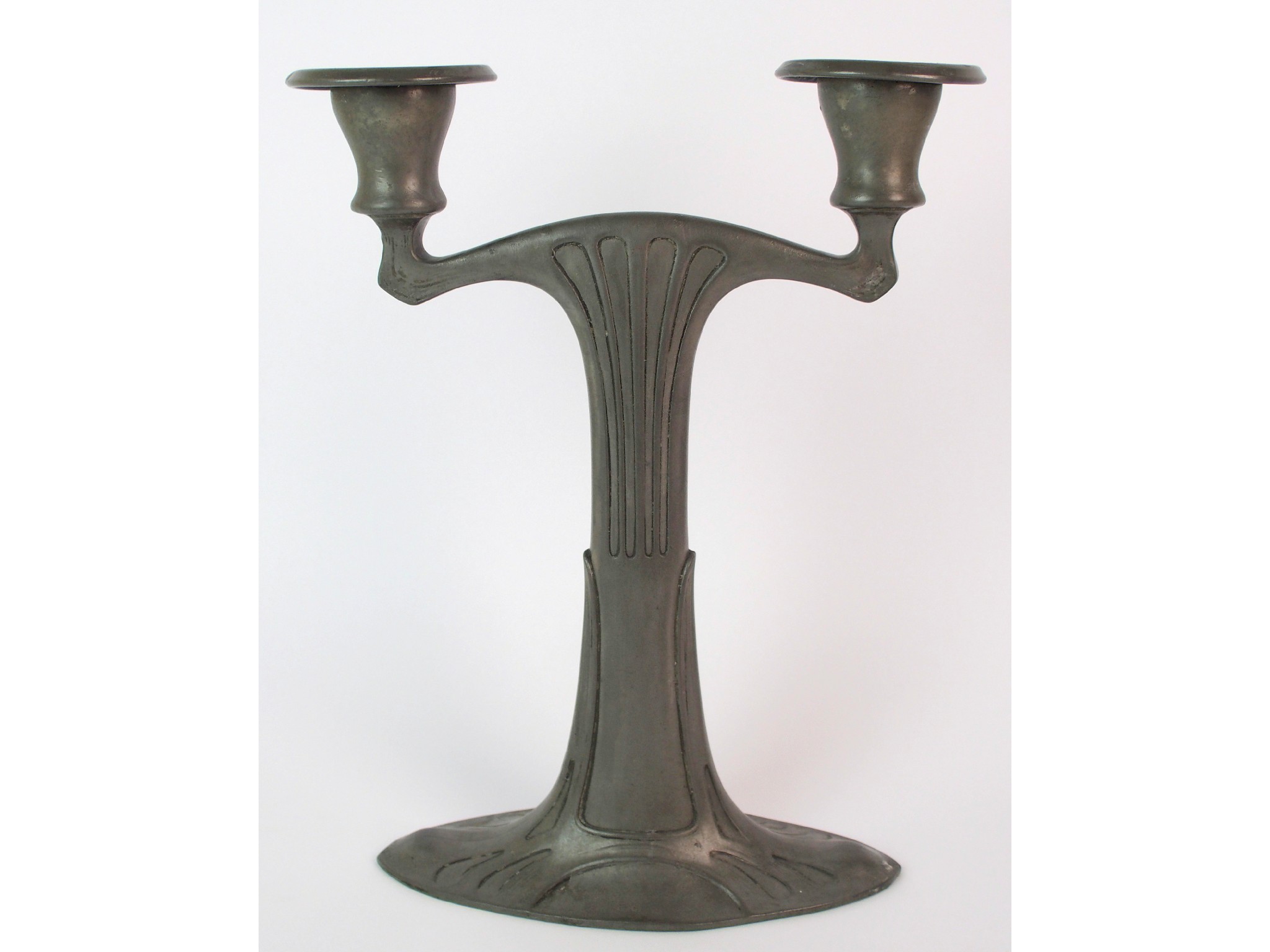 Appraisal: A pewter twin branch candlestickdesigned by Joseph Maria Olbrich cast