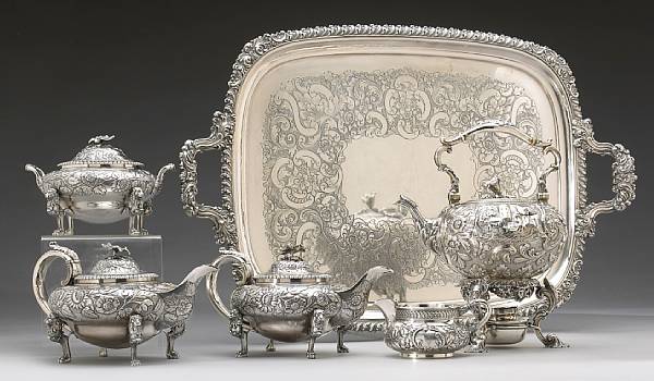 Appraisal: An assembled silver five piece tea set with a Sheffield