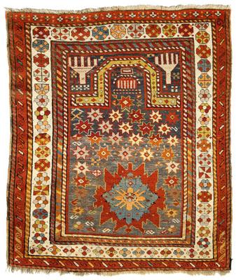 Appraisal: Caucasian prayer rug field with large star medallion on blue