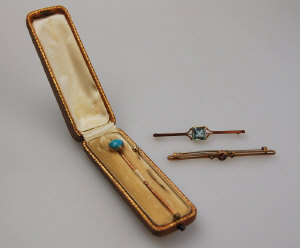 Appraisal: Garnet and seed pearl bar brooch stamped ct blue paste