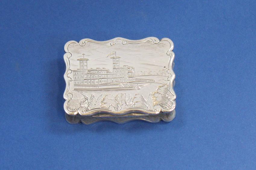 Appraisal: A VICTORIAN ENGRAVED CASTLE TOP VINAIGRETTE of shaped rectangular form