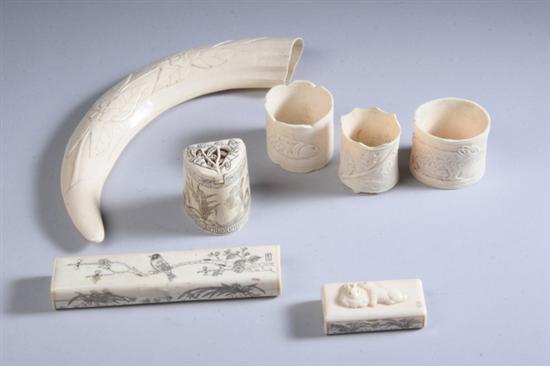 Appraisal: A GROUP OF IVORY AND BONE CARVINGS Comprising tusk carved