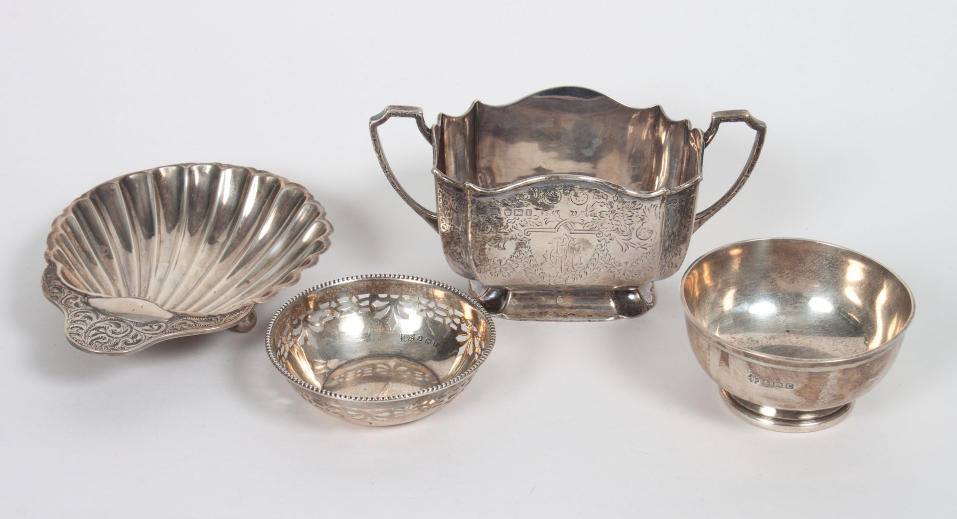 Appraisal: Four English sterling silver table articles including Sheffield engraved open