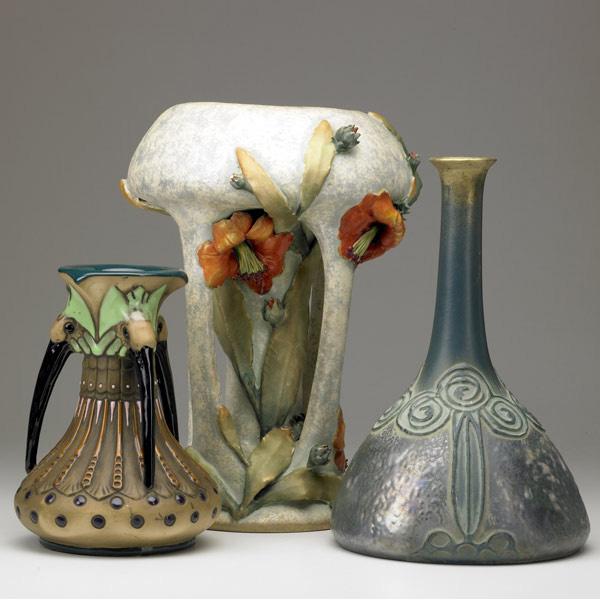 Appraisal: AMPHORA Three vases one by Paul Dachsel with stylized roses