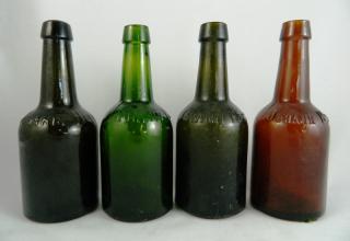 Appraisal: Beer bottles Beer- Johann Hoff amber dark green and light