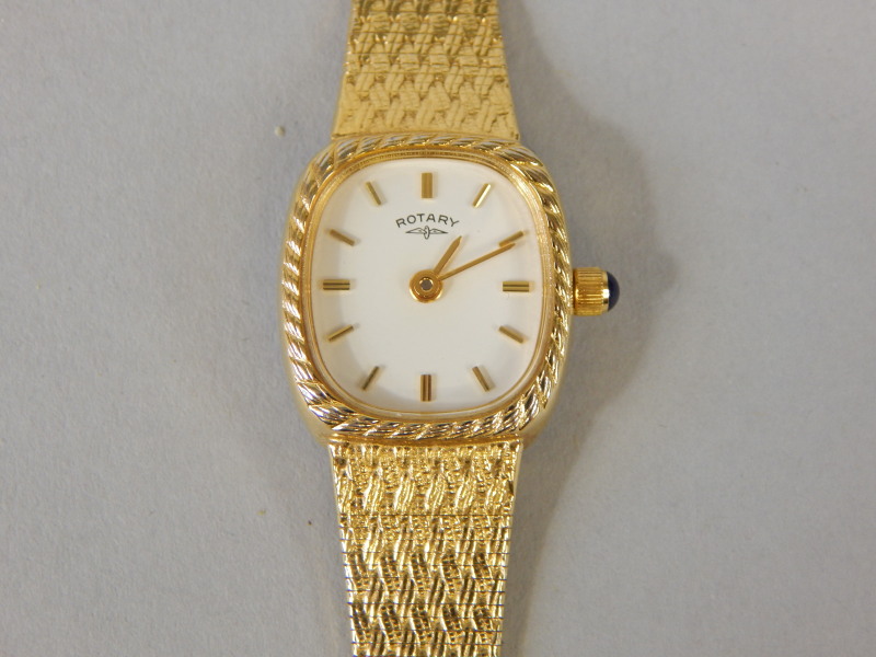 Appraisal: A Rotary ladies wristwatch gold plated with blue stone set