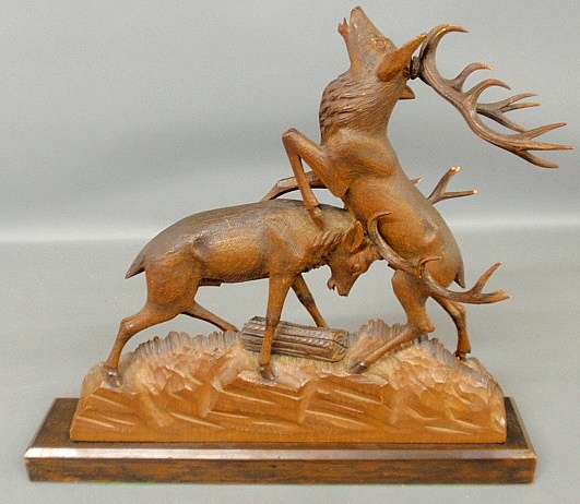 Appraisal: - Black Forest carving of two stags fighting c h