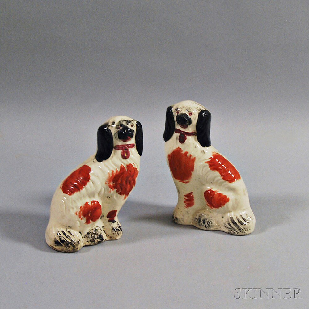 Appraisal: Pair of Staffordshire Spaniels ht in Estimate - crazing throughout