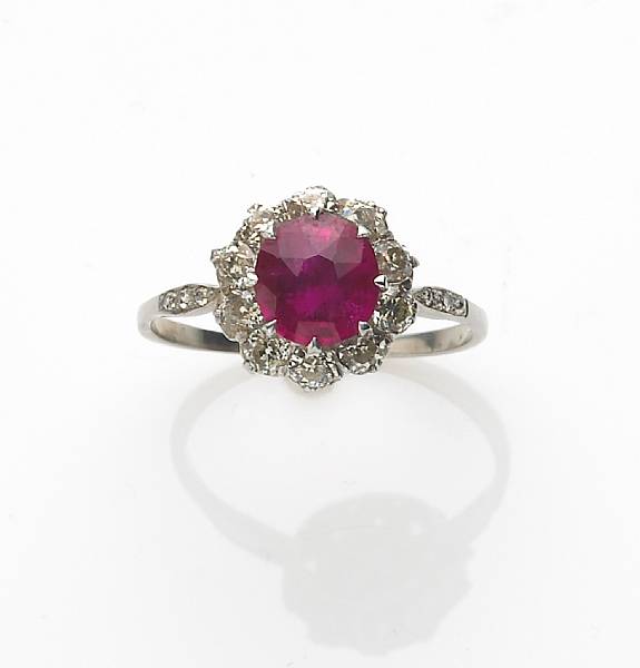 Appraisal: A ruby diamond and k white gold ring estimated ruby