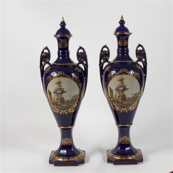 Appraisal: Pair floor standing inch Sevres gilt cobalt porcelain lidded twin-handled