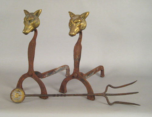 Appraisal: Pair of brass and iron fox head andirons early th