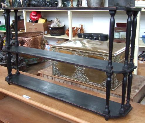 Appraisal: A set of th century ebonised hanging wall shelves