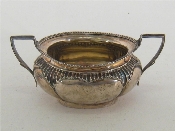 Appraisal: A late Victorian silver two handled lobed oval sugar bowl