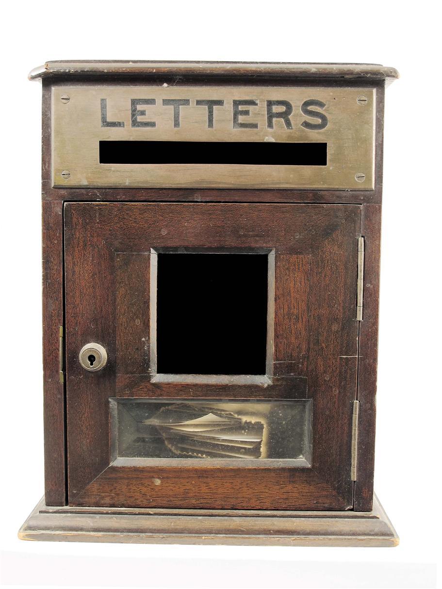 Appraisal: An Edwardian mahogany country house letter box