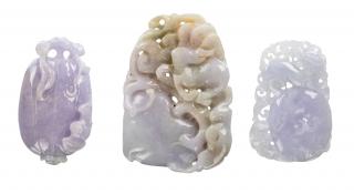 Appraisal: A GROUP OF THREE CHINESE LAVENDER JADE PENDANTS intricately carved