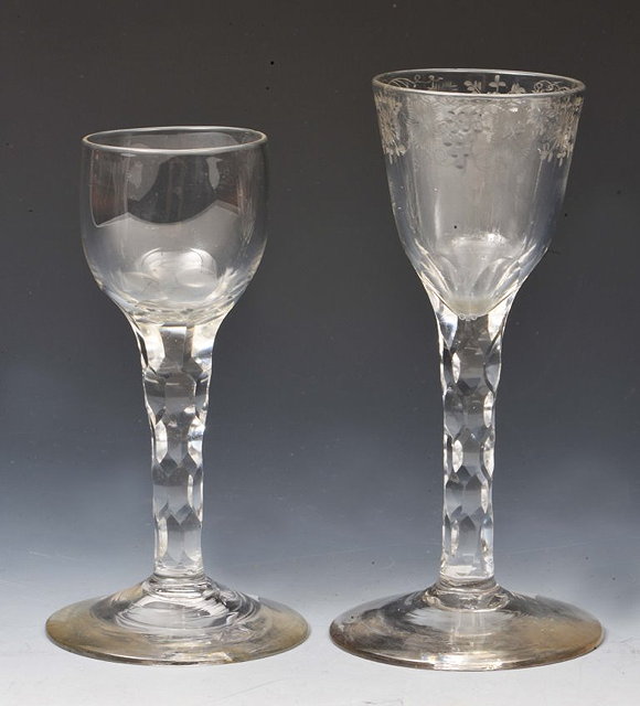 Appraisal: AN ENGLISH WINE GLASS engraved with a band of vines