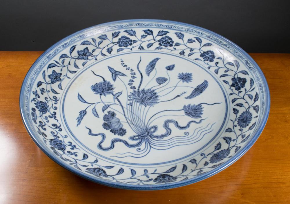 Appraisal: CHINESE BLUE AND WHITE PORCELAIN CHARGER hand painted blue underglaze