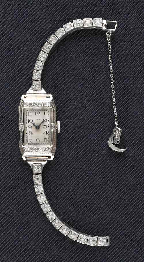 Appraisal: Ladies K white gold Elgin wristwatch with ten accent diamonds