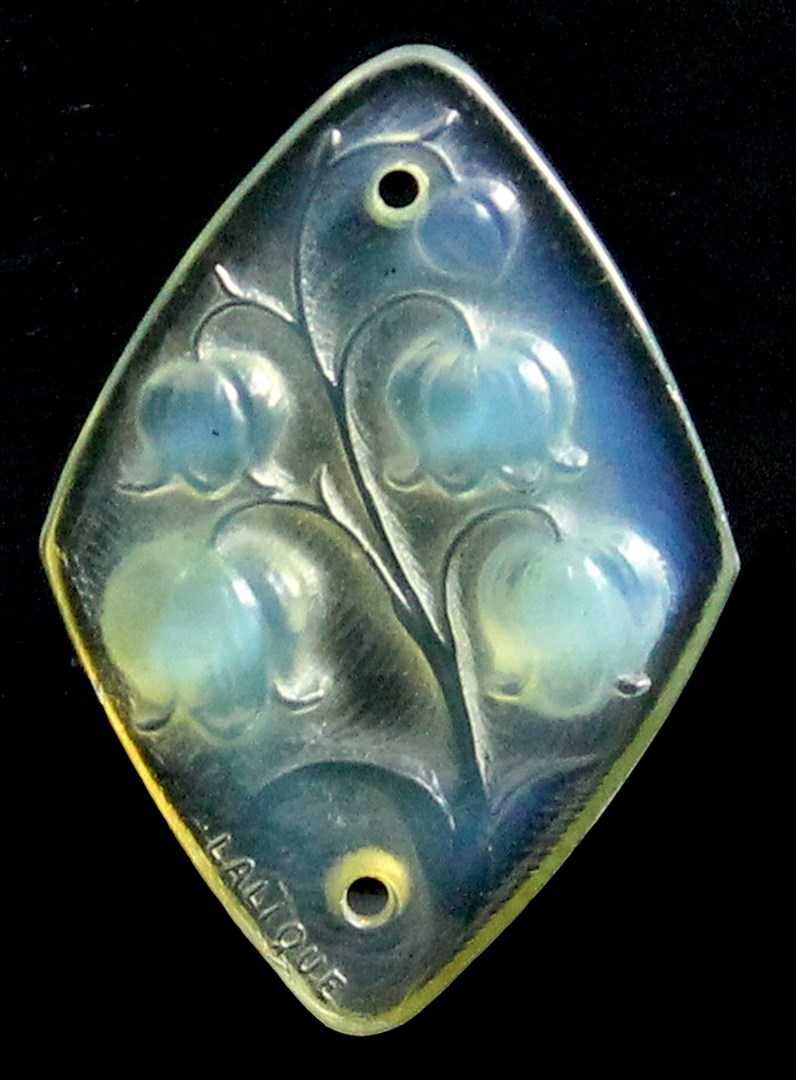 Appraisal: A Lalique opalescent glass pendant of lozenge shaped form decorated