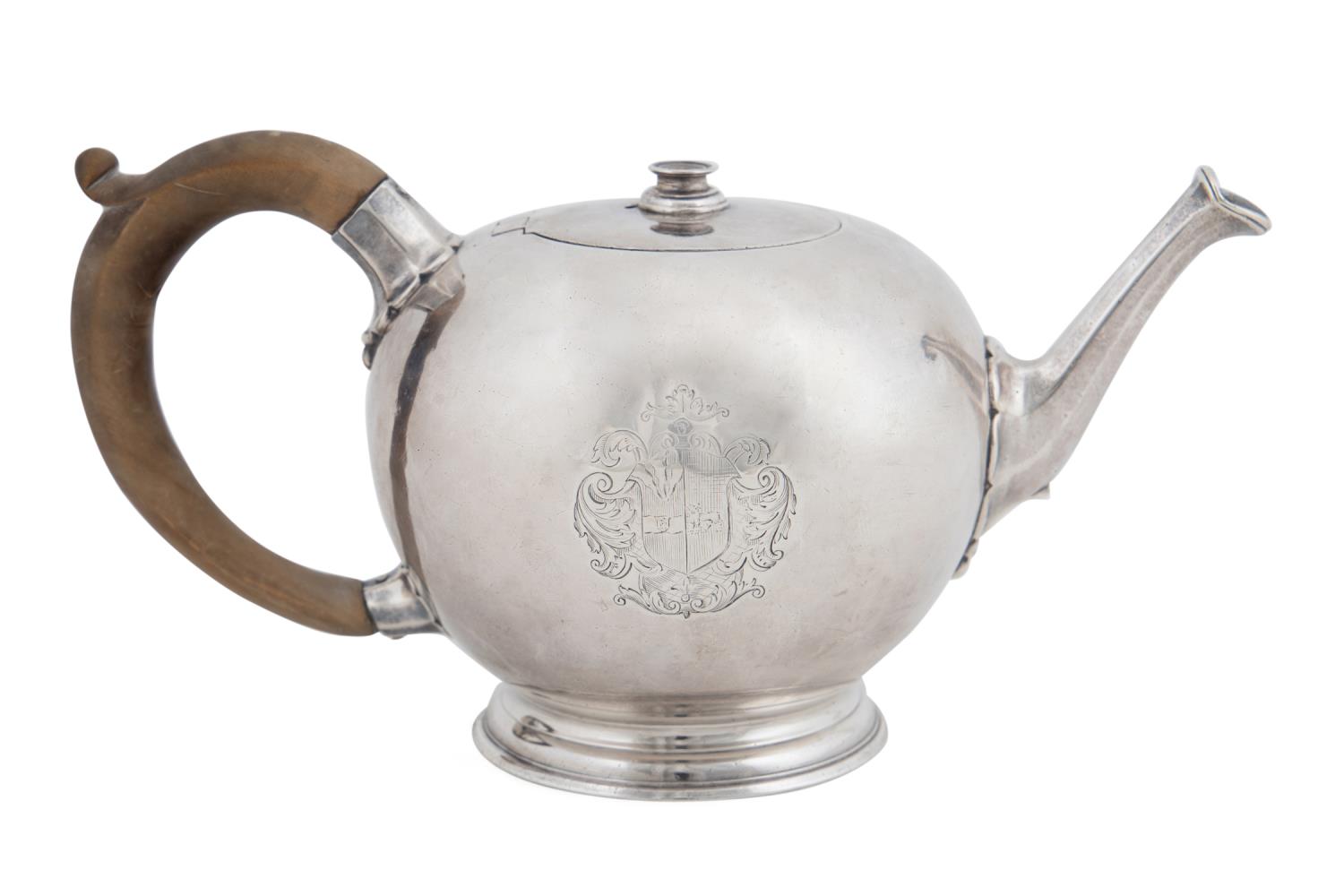 Appraisal: GEORGE II STERLING SILVER ARMORIAL TEAPOT English George II sterling