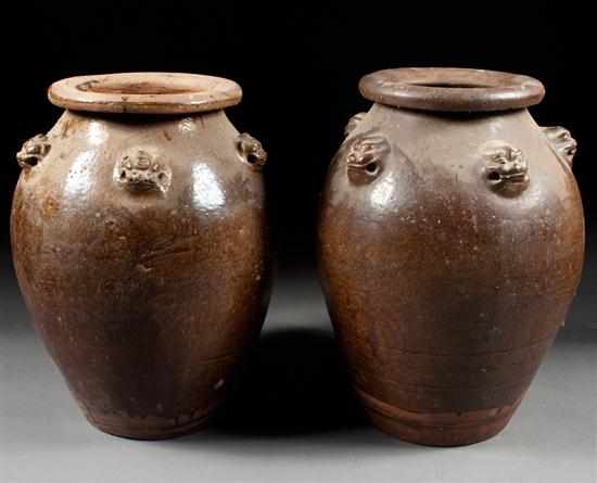 Appraisal: Pair of Chinese Archaic style earthenware wine jars each with