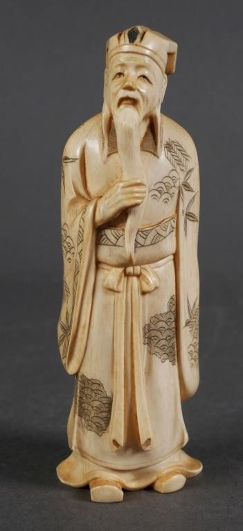 Appraisal: ANTIQUE CHINESE IVORY CARVINGOld ivory carving of man high Please