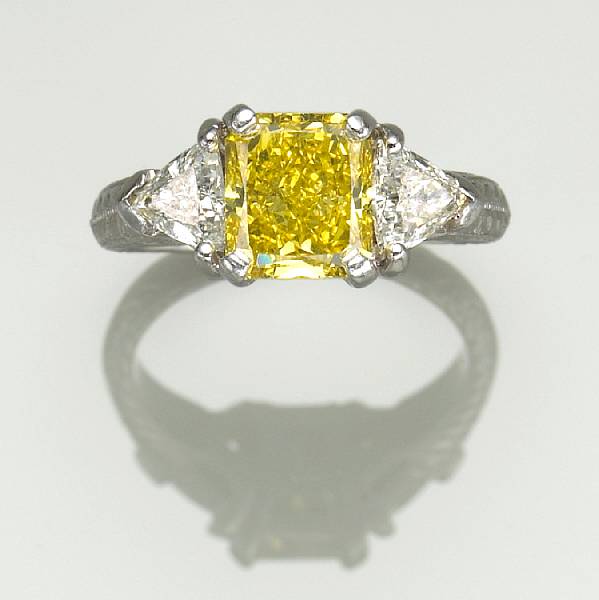 Appraisal: A treated yellow white diamond and platinum ring estimated yellow