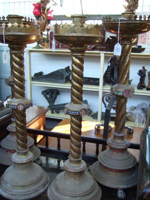 Appraisal: Three pairs of English brass altar candlesticks late th early