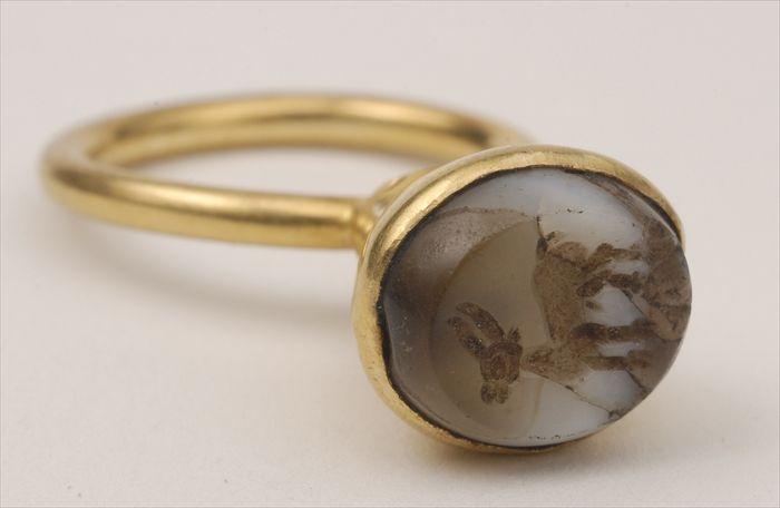 Appraisal: SASSANIAN GOLD RING SET WITH ENGRAVED STONE Approx size Provenance