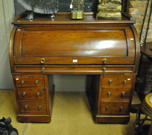 Appraisal: Victorian mahogany cylinder bureau the top with writing pull incorporating