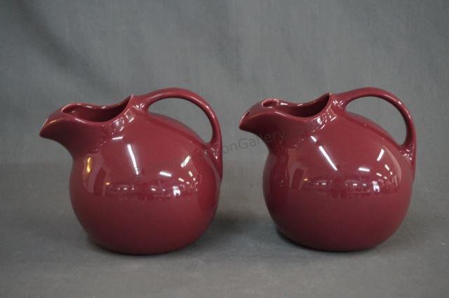 Appraisal: Hall Maroon oz Ball Pitchers ca 's Item tall -