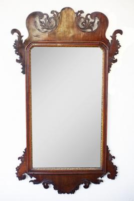 Appraisal: A George III mahogany mirror with a pierced fret frame