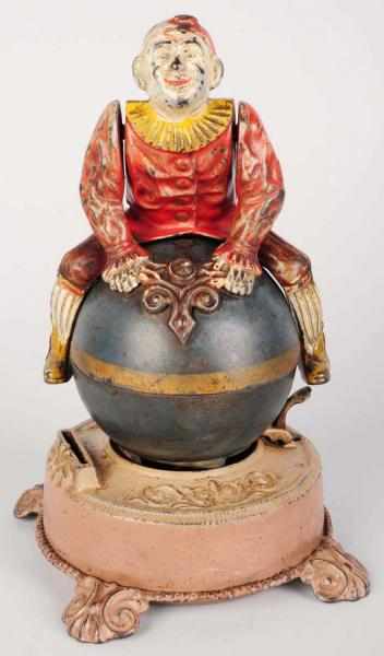 Appraisal: Cast Iron Clown on Globe Mechanical Bank Manufactured by J