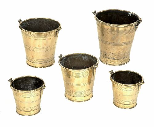 Appraisal: A matched set of five th century graduated brass pails