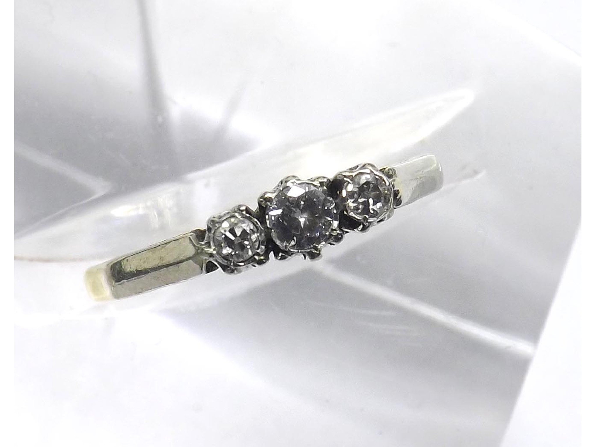 Appraisal: - -a ct and platinum three stone diamond ring ring