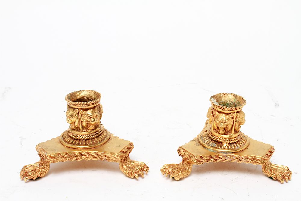 Appraisal: Gilt Metal Lion Head Paw Footed Candleholders Pr Gilt metal