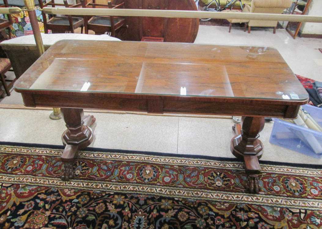 Appraisal: A VICTORIAN ROSEWOOD LIBRARY TABLE English mid- th century having