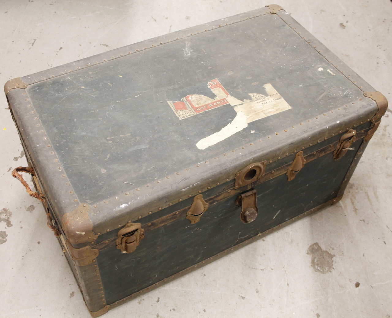 Appraisal: An early thC leather and metal bound travel trunk partial