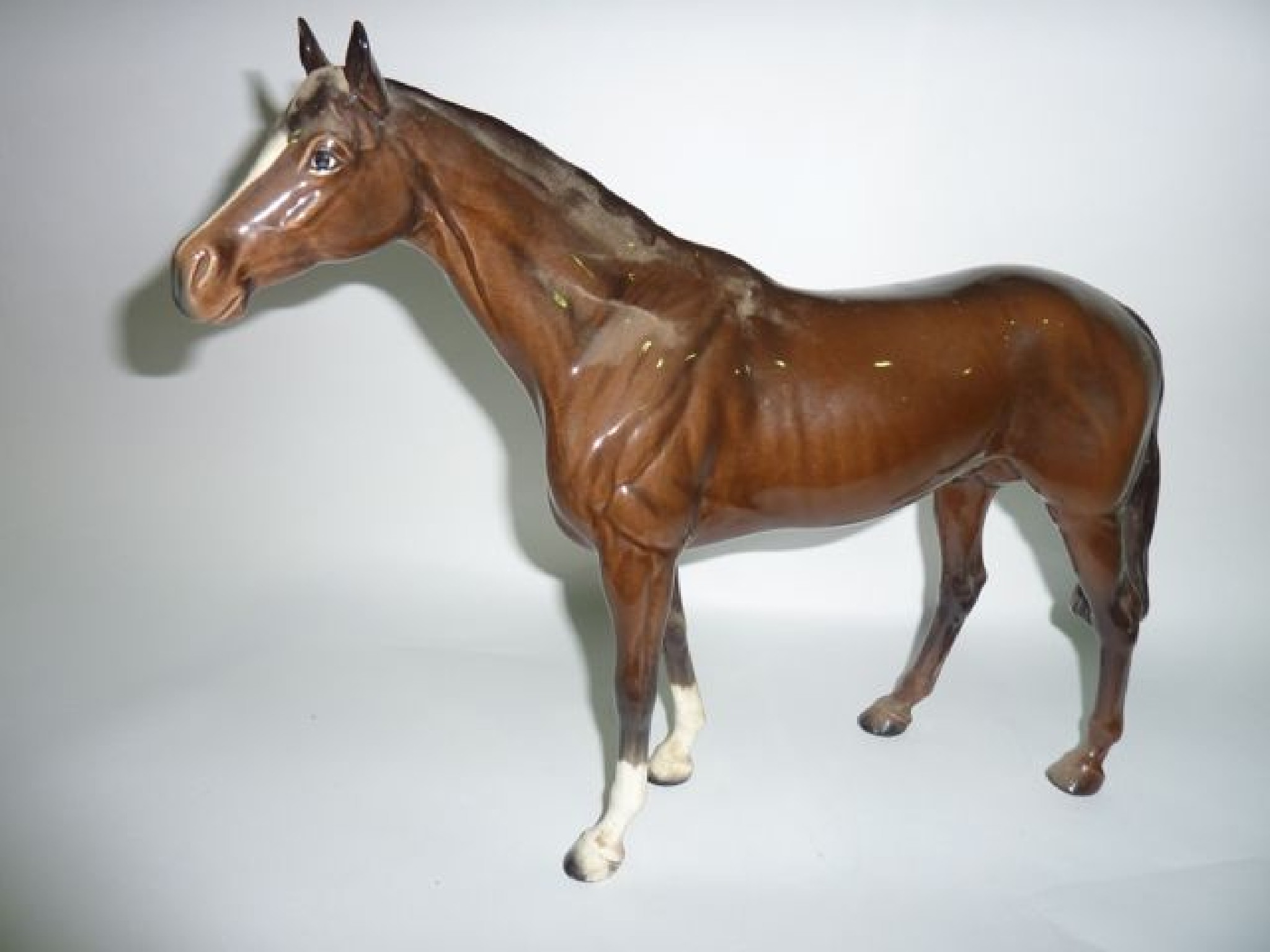 Appraisal: A large Beswick model of a standing brown horse