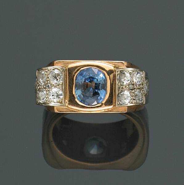 Appraisal: A retro sapphire and diamond ring circa sapphire weighing approximately