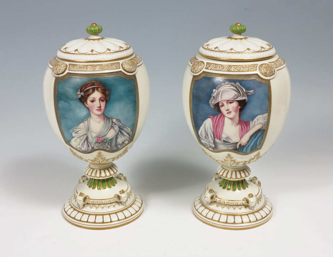 Appraisal: PAIR ROYAL WORCESTER PORCELAIN PORTRAIT URNS Artist signed RID each