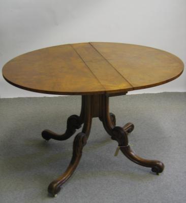 Appraisal: A VICTORIAN BURR WALNUT SUTHERLAND TABLE the oval quarter veneered