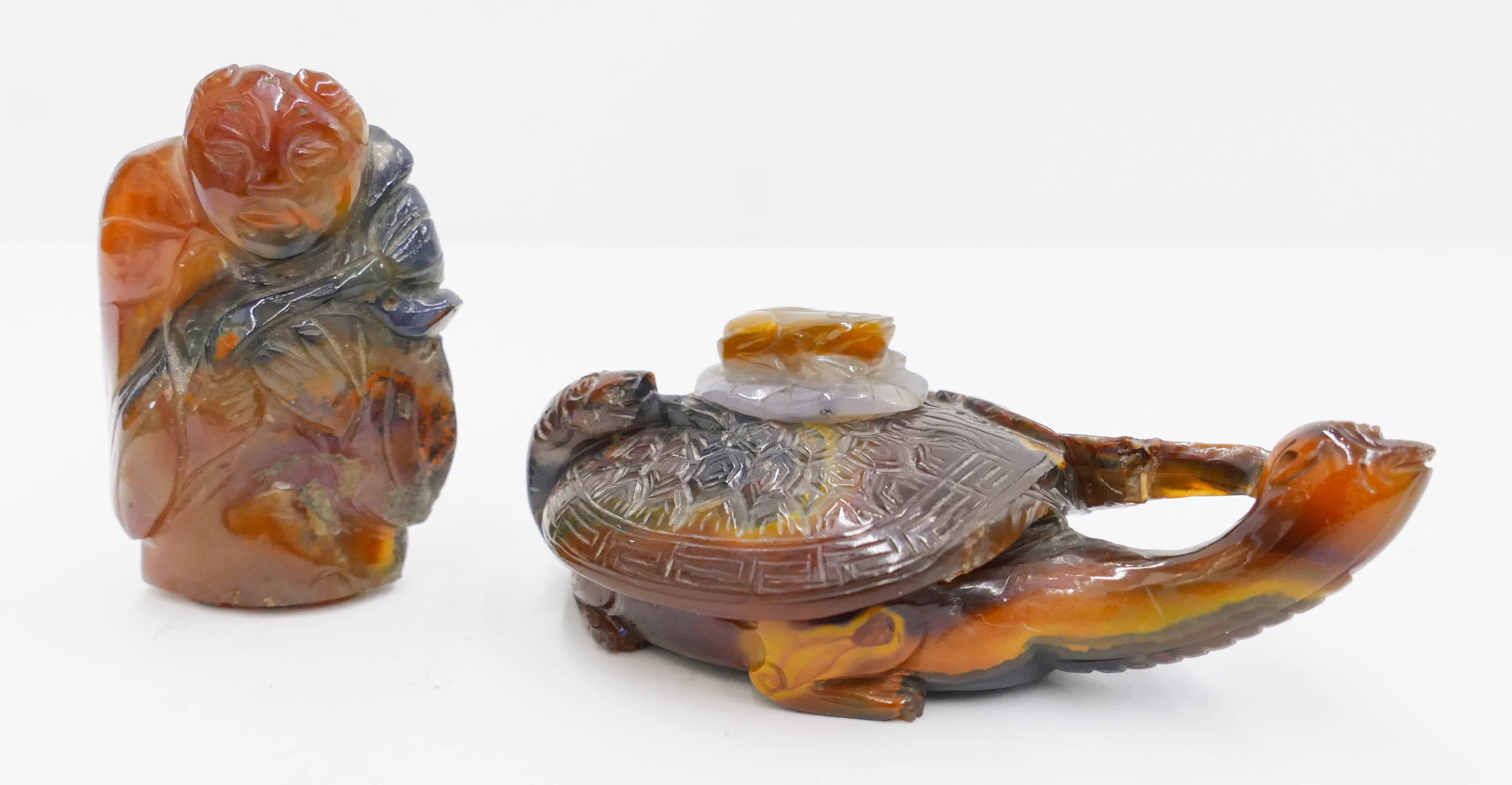 Appraisal: pc Chinese Carnelian Agate Figures '' and '' Includes a