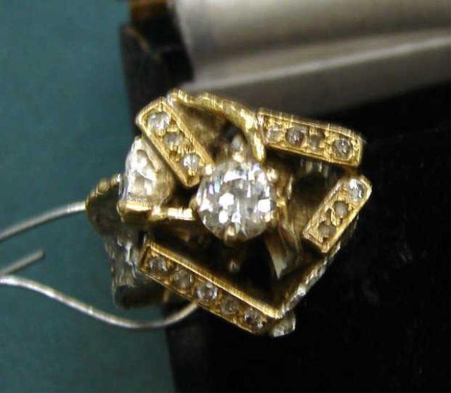 Appraisal: K White Yellow Gold and Diamond Ring Center diamond just