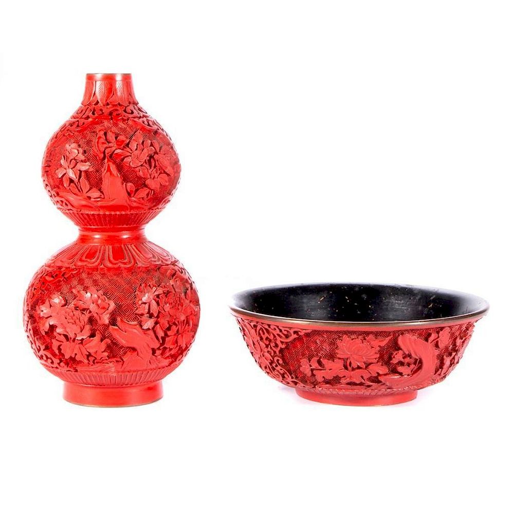 Appraisal: Two pieces of Chinese cinnabar A Chinese carved cinnabar bowl